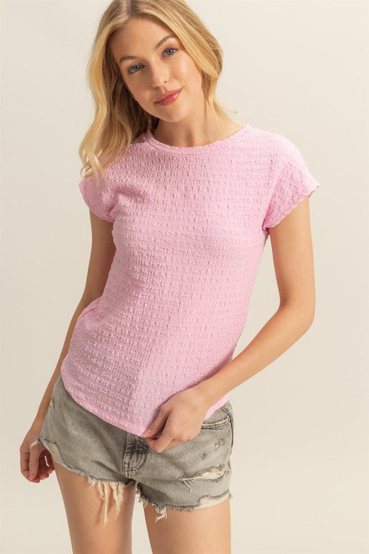 Textured round neck cap sleeve knit top in a versatile design, perfect for everyday wear.