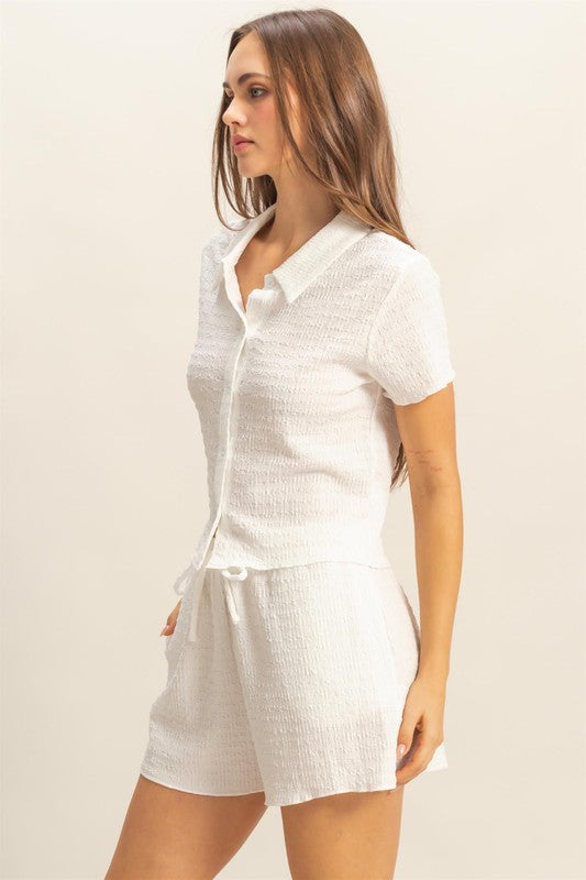 Cozy and stylish textured knit short sleeve top & drawstring shorts set, perfect for lounging or casual outings.