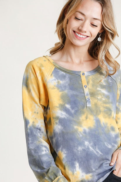 Tie-dye button front long raglan sleeve top featuring a trendy pattern, breathable cotton fabric, and a relaxed fit for everyday comfort.