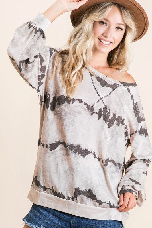 Colorful tie-dye French terry long sleeve t-shirt with a round neckline, perfect for casual and cozy wear.