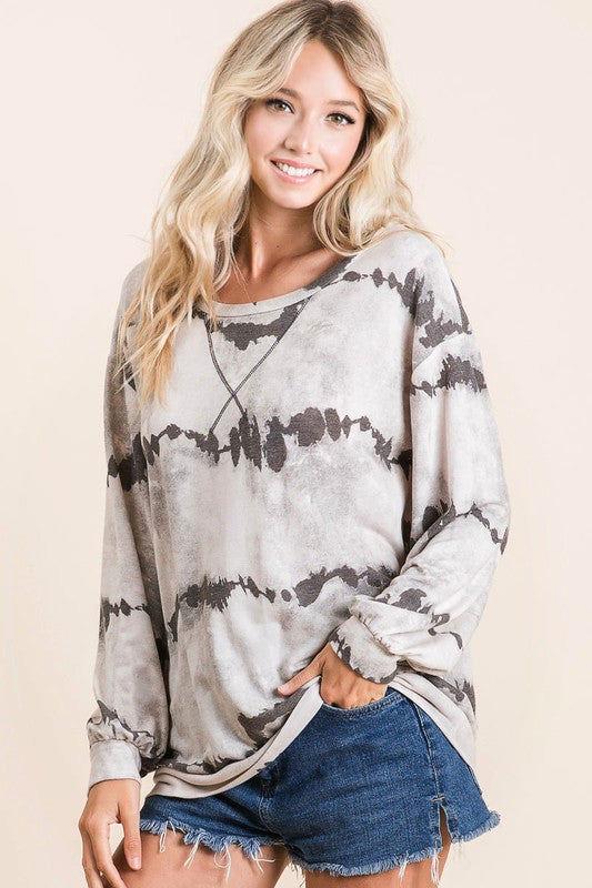 Colorful tie-dye French terry long sleeve t-shirt with a round neckline, perfect for casual and cozy wear.