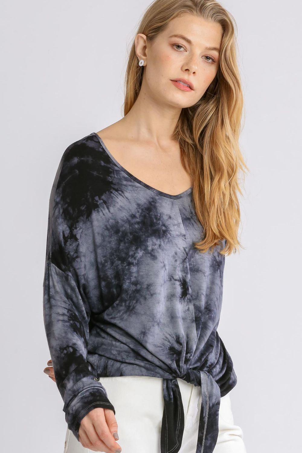 Trendy full-size tie-dye lightweight long sleeve top featuring a colorful print, breathable fabric, and a relaxed fit for casual wear.