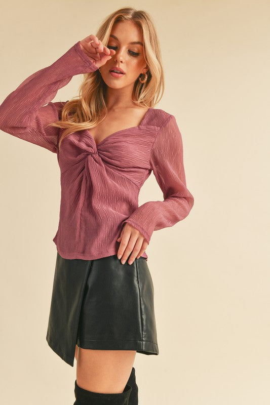 Elegant twisted sweetheart neck long sleeve blouse, perfect for a chic and sophisticated look.