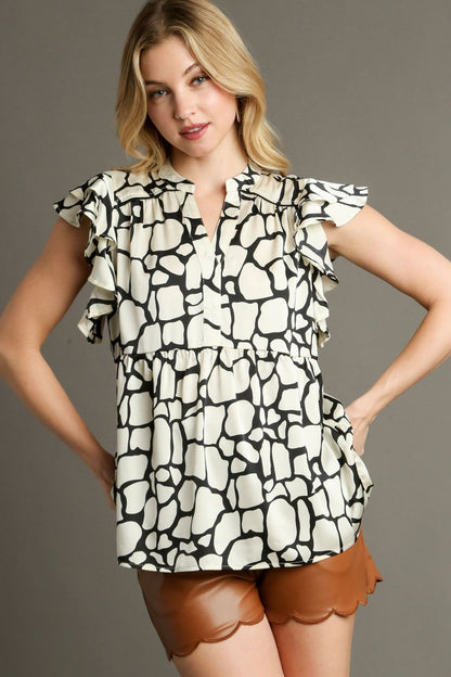 Trendy two-tone animal print blouse with ruffled cap sleeves and a notched neckline, perfect for versatile styling.