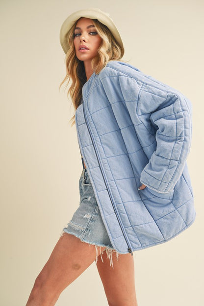 Trendy quilted washed jacket with a zip-up front & drop shoulder design for a relaxed and stylish look.